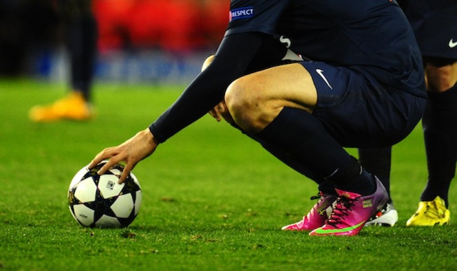 Player hand on UEFA ball Player hand on UEFA ball